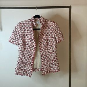 Oscar de la Renta red and white blouse.